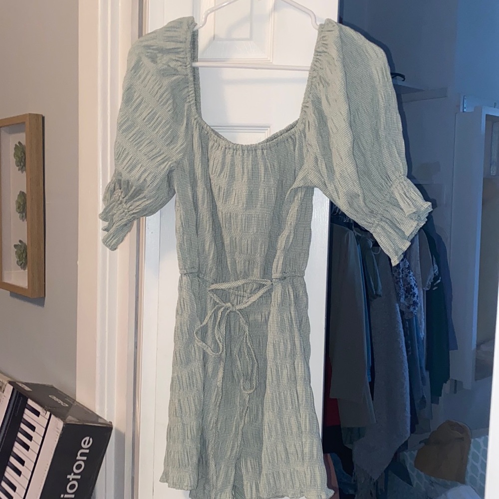 Brand new Molly Green romper size small